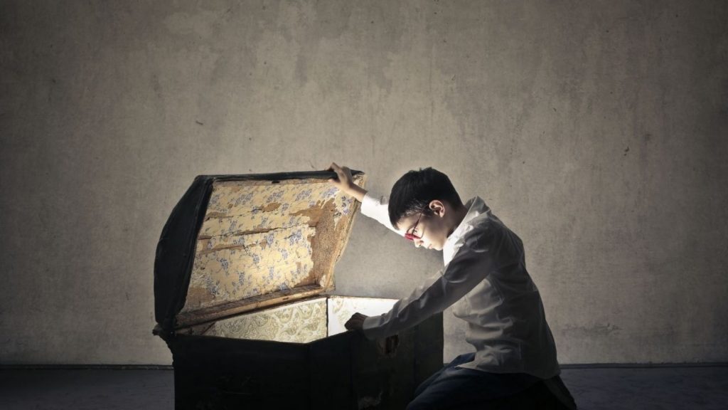 Boy opening a box