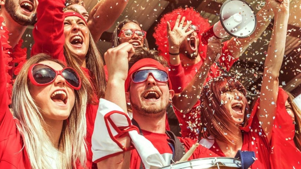 Fans wearing red clothes