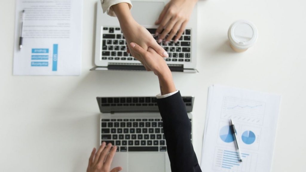 People shaking hands on collaboration